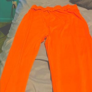 Orange leggings.